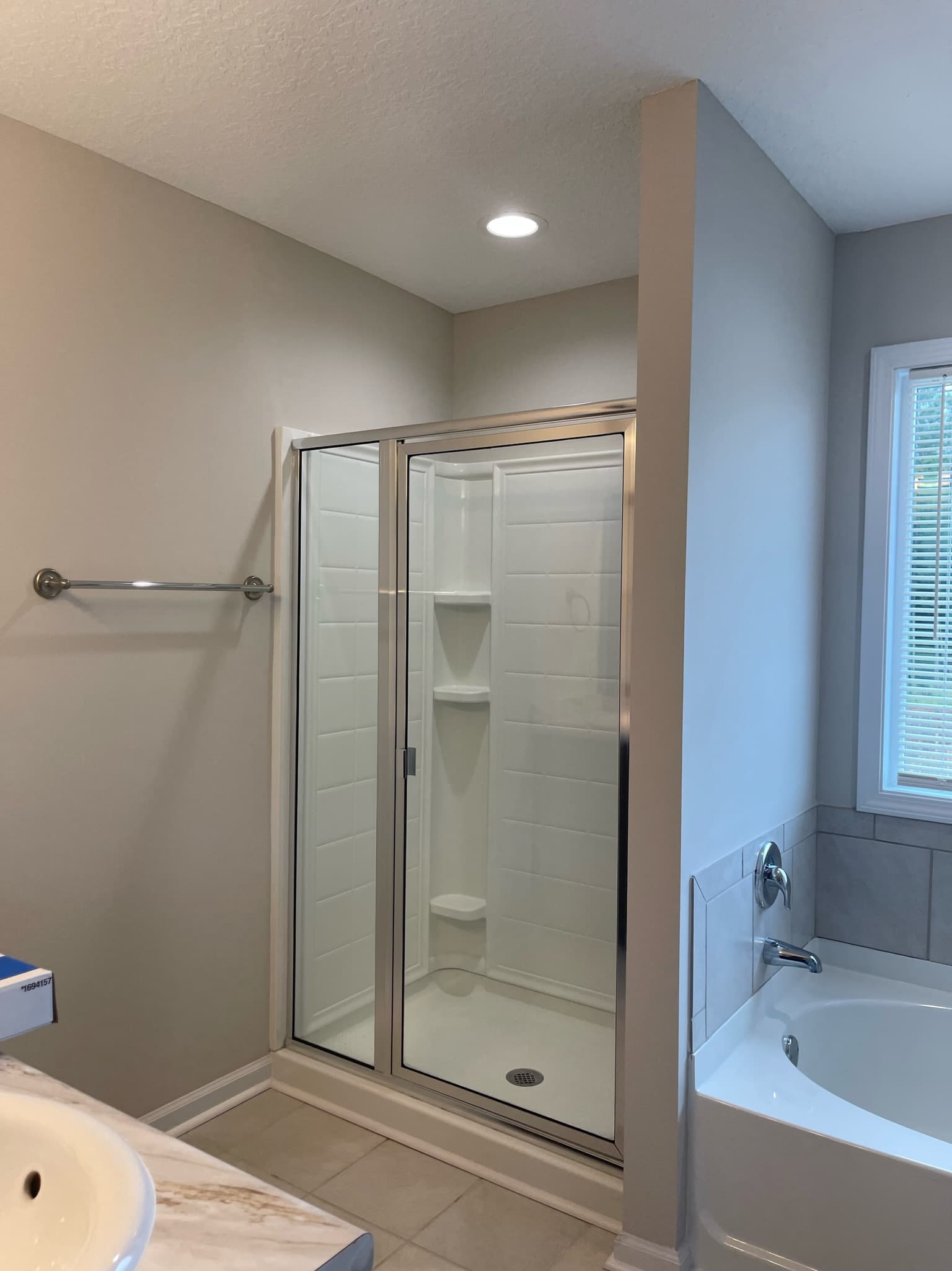 Bathroom shower opening before glass door installation